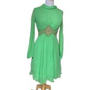 Vintage 60’s green mini dress with sheer sleeves and beading size 6